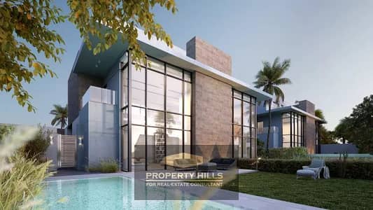 Townhouse 235 meters with a private garden overlooking the lagoon next to Sodic and Emaar