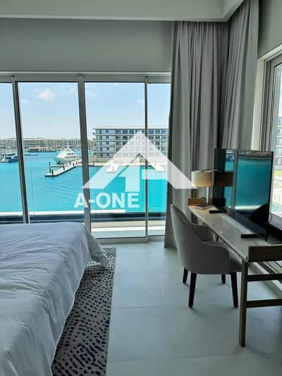 A hotel apartment for sale with a panoramic view and at a price lower than the market in The Address Beach in the best location in Marassi North Coast