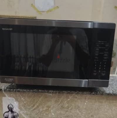 Microwave sharp flatbed 32L ميكروويف شارب فلات بيد اسود ٣٢ لتر
