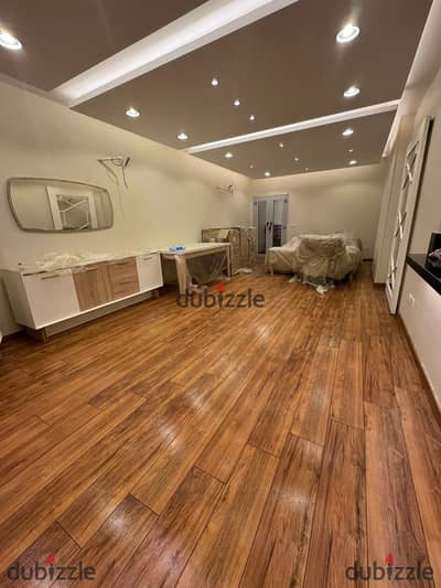 Apartment for rent in Andalus, with kitchen and air conditioning, ultra-super deluxe finishing, first occupancy, HDF flooring, elevator available