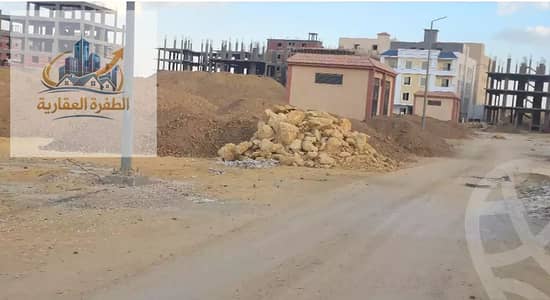 Distinct land for sale north of Al-Rehab, on the divider and clear income from the Suez Road.