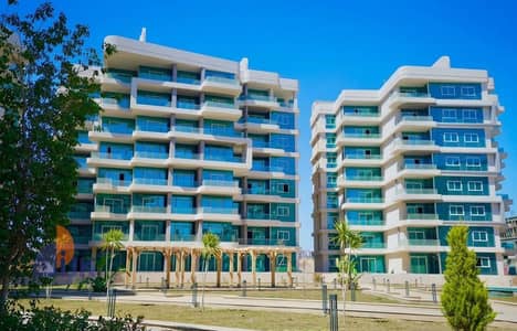 شقة لقطة للبيع 160 متر أرضى بجاردن  استلام فورى فى قلب ال R 7 العاصمة الإدارية الجديده New Administrative Capital