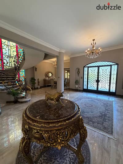 Independent villa for sale, corner with swimming pool - Mina Garden City