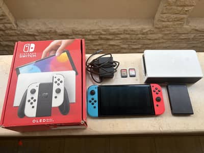 Nintendo Switch OLED with 2 games and 2 extra original controllers
