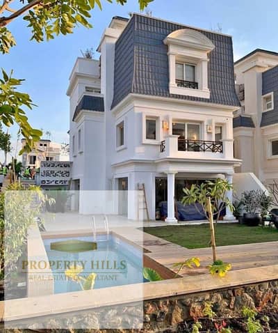 Villa for sale, finished and immediate delivery, at a lower price than the market at Mountain View Grand Valley next to Mivida and Hyde Park