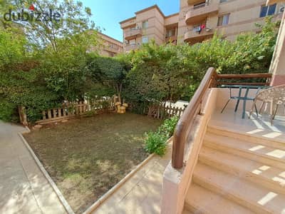 Two-bedroom apartment with garden for sale in Al-Rehab with furniture and appliances at a bargain price