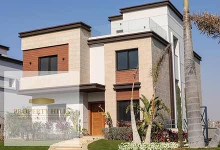 فيلا منفصله اقل من سعر السوق في التجمع كمبوند ازار علي شارع التسعين لقطه
