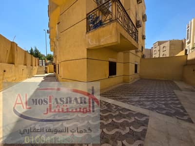 Apartment for rent in Sheikh Zayed, Eighth District, Third Neighboring Area, Ground Floor, Area 180 + 200 Paved Garden with High-End Finishing divided into 3 Rooms + 2 Bathrooms
