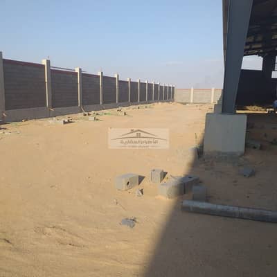 Plot of land for sale in 10th of Ramadan City, 23,000 square meters; includes a license for a plastic factory.