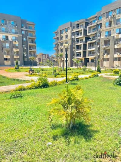 Apartment in Jannat October Compound, opposite Mall of Arabia, next to Shooting Club and on Gamal Abdel Nasser Axis