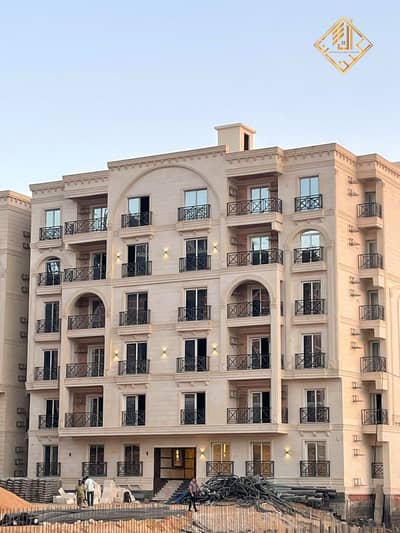 Your128m² apartment in October Gardens. . . immediate handover and a 10-year installment plan.