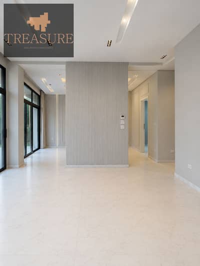 semi furnished Apartment with garden for rent in Waterway - new cairo