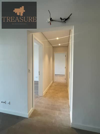 finished Apartment with garden for sale in Mivida – Blue Views - new cairo