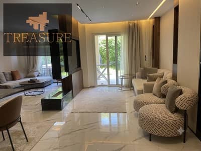 furnished Apartment with garden for sale in Stone Residence - new cairo