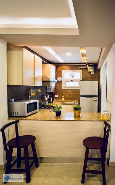 Furnished 60 sqm studio apartment for rent in Mirage Residence, First Settlement, directly on Mustafa Kamel Axis.
