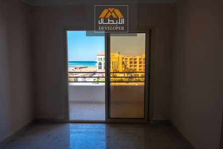 99 sqm 2-bedroom sea-view apartment, ready to move in, at 3Pyramids Compound in El Ahyaa, super lux finishing.