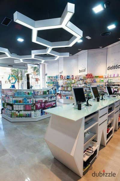 Pharmacy for Sale in First Settlement Serving Mirage Villas, Leased & Operating, Prime Location in a Mall with Brands, Restaurants & Cafés, Rental