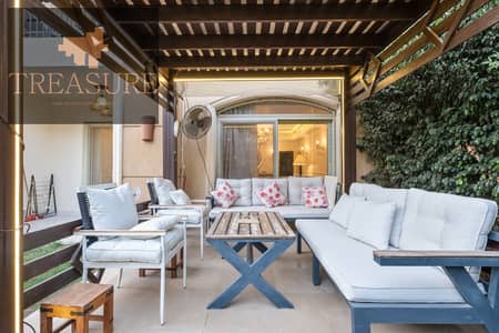 furnished Apartment with garden for rent in Stone Residence - new cairo