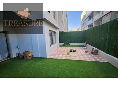 finished Apartment with garden for sale in Galleria Moon Valley - new cairo
