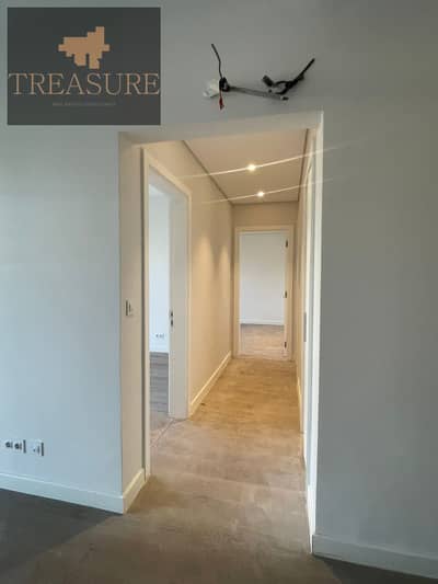 finished Apartment with garden for sale in Mivida – Blue Views - new cairo
