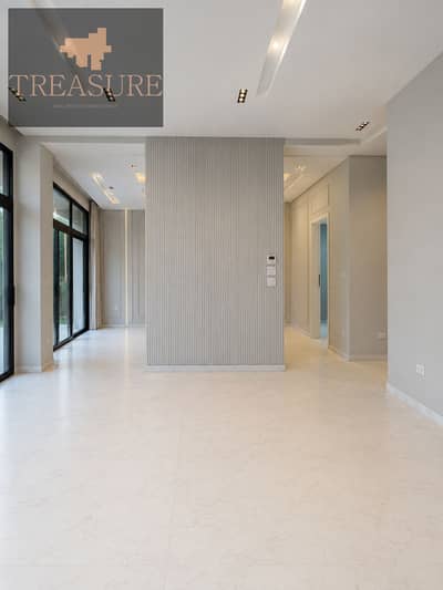 semi furnished Apartment with garden for rent in Waterway - new cairo