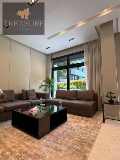 furnished Apartment with garden for rent Waterway - new cairo