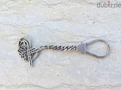 ميداليه مفاتيح فضه عيار ٨٠٠