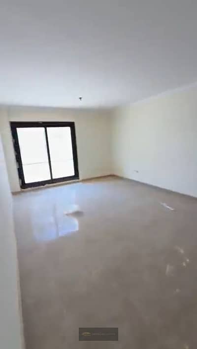 Apartment for sale in Compound Plus Gate - Sheikh Zayed, area 140 meters, first floor, minutes from all main axes and roads and Hyper One and Dandy Mall
