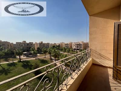 Fully furnished apartment for rent (hotel-style) in Al-Nakheel Compound, First Settlement. Features a rear garden view and an open front view;