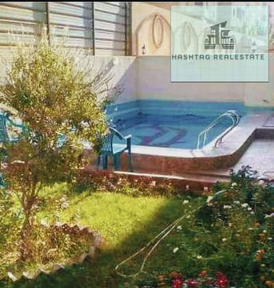 For sale, a distinctive apartment in the Little Investor with an elevator in a building that has a swimming pool, fully finished and ready for occupancy.