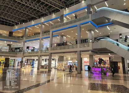 Shop for sale with 875,000 down payment in Fifth Settlement, prime location, directly opposite Rehab Gate on Sadat Axis. A great investment opportunit