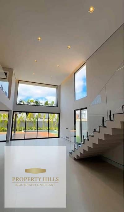 Last villa ready for viewing with a private garage, compound of villas only, view landscape in the heart of the assembly next to the American University.