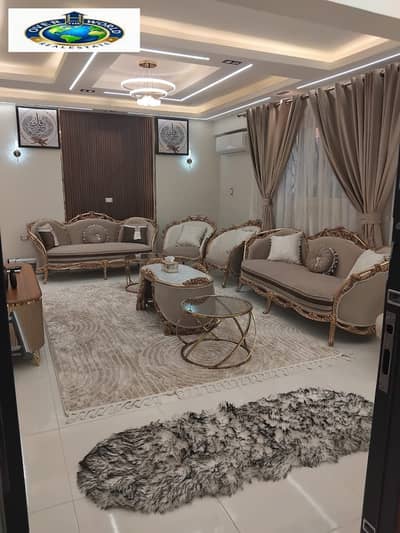 Furnished hotel apartment for rent in 6 October, fourth district, next to Royal International School. 2 rooms and a bathroom, private entrance, first residence, starting from a week today, 1500 monthly, 35000. The apartment has a private entrance with a garden and is still a first residence, all contents and furniture are new, gas network, 2 screens, 65 inches, 4 air conditioners, and 2 bathrooms. Furnished hotel apartment for rent in 6 October, fourth district, next to Royal International School. 2 rooms and a bathroom, private entrance, first residence, starting from a week today, 1500 monthly, 35000. The apartment has a private entrance with a garden and is still a first residence, all contents and furniture are new, gas network, 2 screens, 65 inches, 4 air conditioners, and 2 bathrooms.