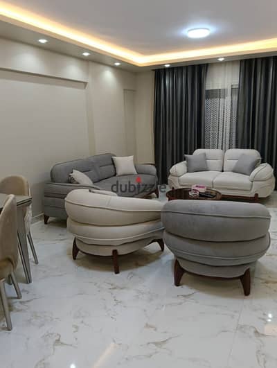 Furnished, air-conditioned hotel-style apartment next to City Stars, available for daily and monthly rent for families. Excellent location in Nasr Cit