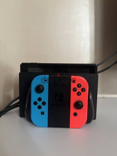 Nintendo v2 with 10 games that includes mario odyssey