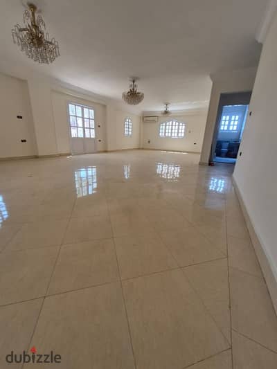 300-square-meter apartment for rent in the Public Security Compound, featuring custom kitchen finishes, appliances, and air conditioning.