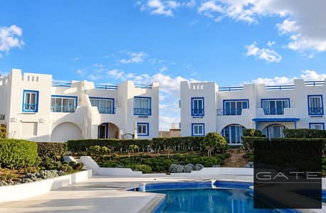 Twin house for sale with direct dual views of the sea and the swimming pool at Mountain View Ras El Hekma – Greek Islands phase.