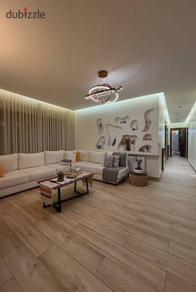 Apartment for sale with the lowest down payment in Market Direct on the Suez Road and opposite Cairo Airport, near Al Rehab Taj City Compound