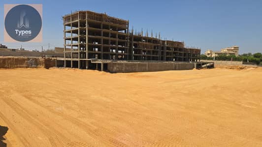 for sale an apartment of 125 sqm with a 10% down payment and installments over 10 years in Elysium Compound, next to Jazal, Bahja, and Karma Kay
