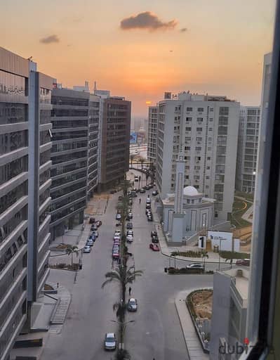 Apartment for sale in Compound One Qattameya 129 meters half finishing pool view and clear sea view and excellent internal division