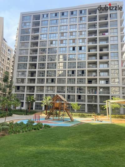 Apartment for sale in One Qatami compound 105 meters half finishing with a view of the mosque and the main street and an excellent internal division.