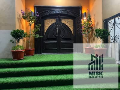 Prime ground floor villa in 5th District behind Farid Habib: 4 bedrooms, 3 baths, 5-piece reception, large kitchen, mini bar, private garden furnished
