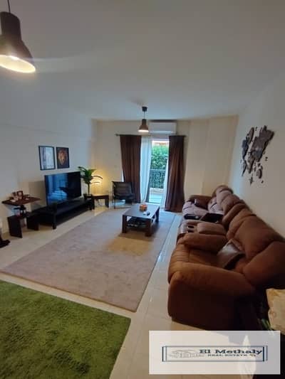 89m² apartment for sale in Al Rehab (Phase 7) with a 50m² garden.