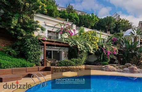 Receive immediately a finished villa with 3 floors and a swimming pool in Mountain View Fifth Settlement next to AUC and BUE and near The Waterway and Hyde Park and CFC and Mivida