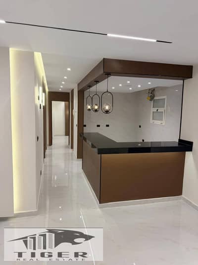 In my city, an apartment for sale with special finishes, the area of the apartment is 131 meters, group 62, three bedrooms and two bathrooms, Talaat Mostafa, a large and open garden view and a street, the apartment is corner-facing directly in front of the food court and McDonald's, the doors are fully imported Turkish doors and the Turkish armored door is 11 cm, porcelain spa