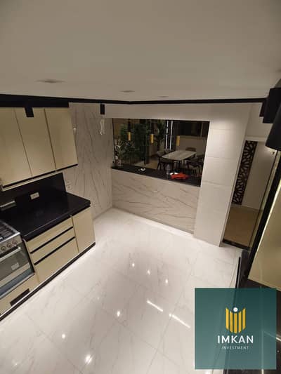 Apartment for sale in Al-Jar Sheraton—3 bedrooms, fully finished, including A/C units and kitchen—located behind City Centre Almaza Mall; available vi