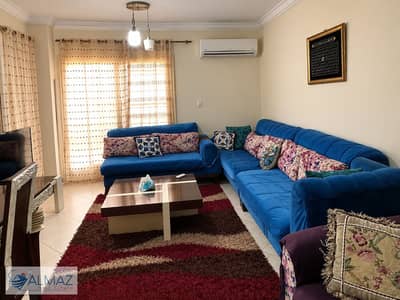Fully air-conditioned, furnished apartment for rent in the Dar Misr Al-Qaranful compound in the First Settlement, directly opposite Al-Rehab City.