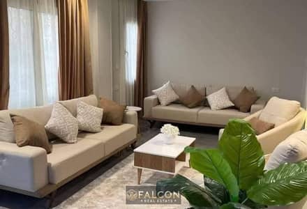 Luxury apartment with high-end finishes from Qatari Diar for sale in City Gate, next to Hyde Park, minutes from the American University in Cairo (AUC)