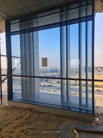 A shop ready for viewing—available for immediate handover—located on the second floor of the "One Ninety" complex in the Fifth Settlement (New Cairo).