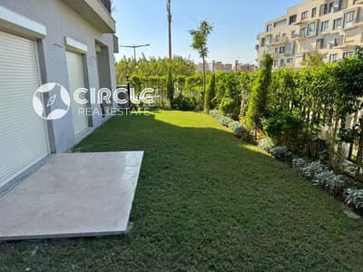 Luxury 150 sqm apartment with a 70 sqm private garden, equipped with kitchen and ACs, for resale in Eastown by SODIC, New Cairo.